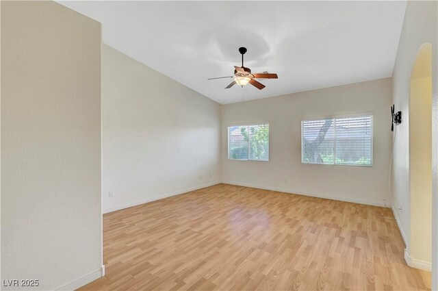 4197 Bottiglia Ave, Las Vegas, NV 89141 - unfurnished room with a ceiling fan, light wood finished floors, and baseboards