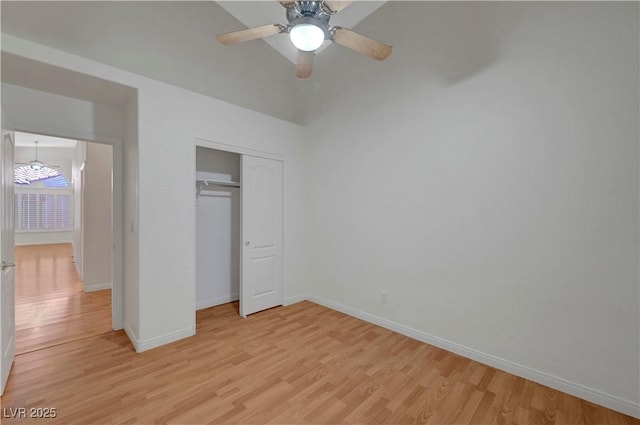 4197 Bottiglia Ave, Las Vegas, NV 89141 - unfurnished bedroom featuring light wood-type flooring, baseboards, a closet, and a ceiling fan