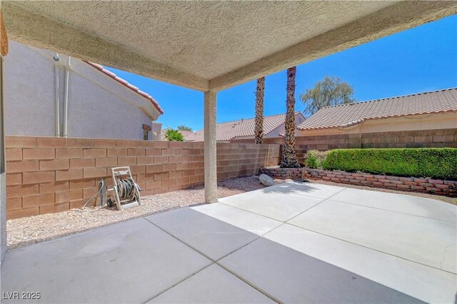 4197 Bottiglia Ave, Las Vegas, NV 89141 - fenced backyard featuring a patio area