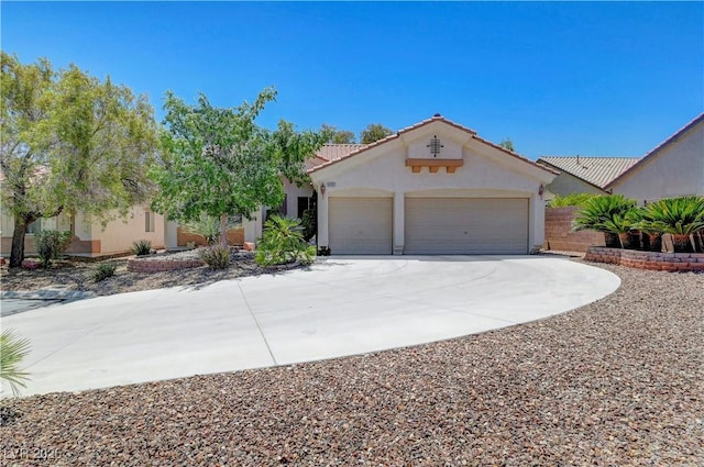 4197 Bottiglia Ave, Las Vegas, NV 89141 - mediterranean / spanish-style home with stucco siding, a garage, concrete driveway, and a tiled roof