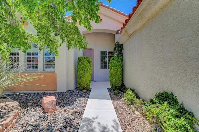 4197 Bottiglia Ave, Las Vegas, NV 89141 - doorway to property featuring stucco siding