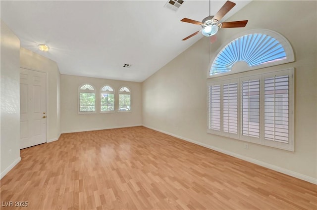 4197 Bottiglia Ave, Las Vegas, NV 89141 - unfurnished room with wood finished floors, a ceiling fan, baseboards, and high vaulted ceiling