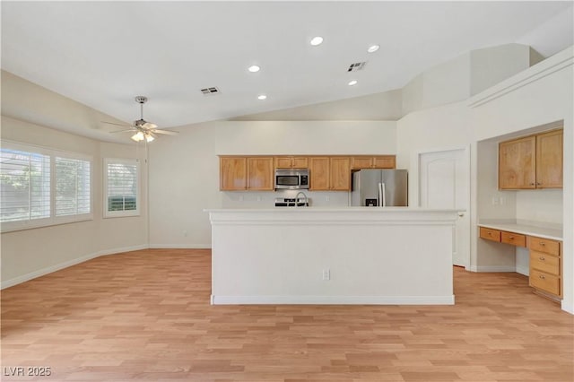 4197 Bottiglia Ave, Las Vegas, NV 89141 - kitchen featuring appliances with stainless steel finishes, light wood finished floors, baseboards, ceiling fan, and recessed lighting