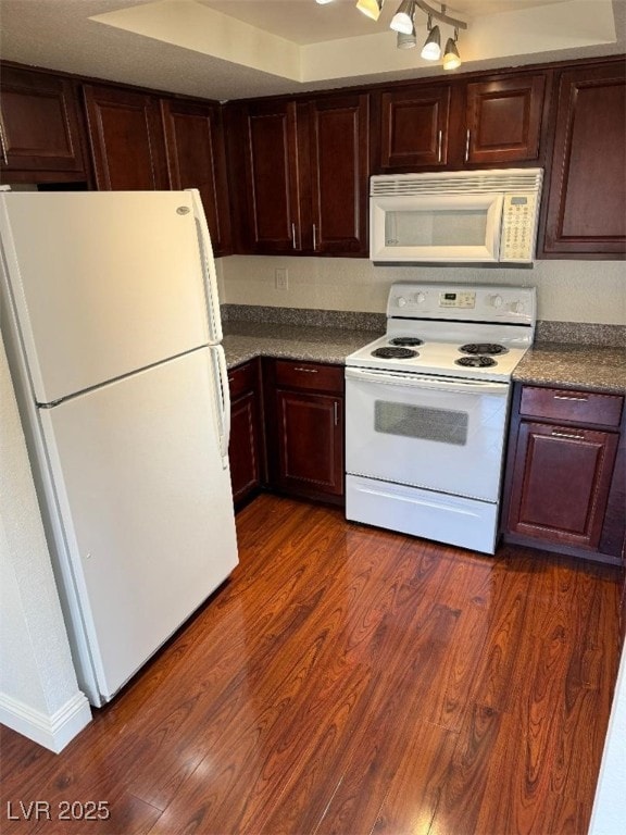 2212 Sunfish Dr Unit D, Henderson, NV 89014 - kitchen with white appliances, dark wood finished floors, dark countertops, and dark brown cabinetry