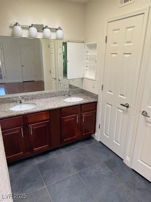 2212 Sunfish Dr Unit D, Henderson, NV 89014 - bathroom with double vanity and tile patterned flooring