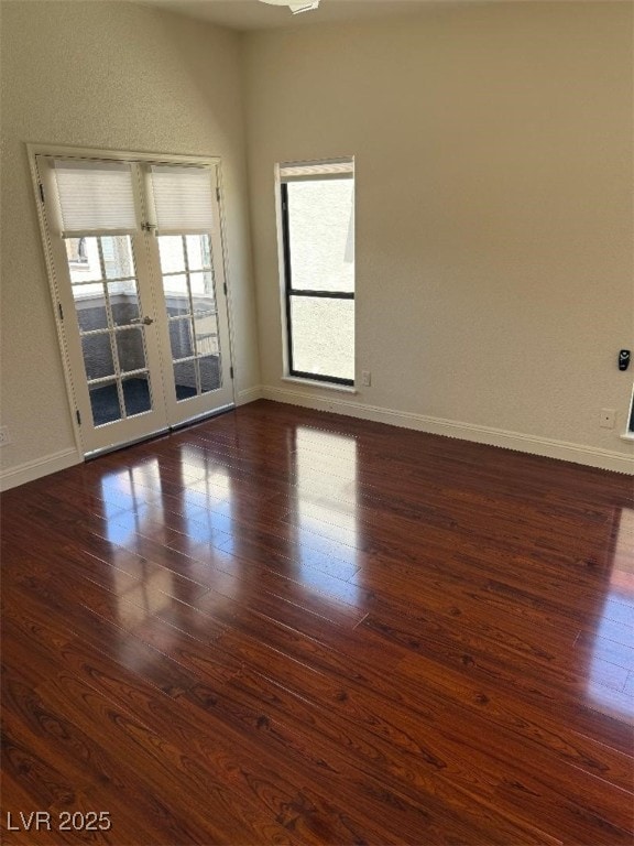 2212 Sunfish Dr Unit D, Henderson, NV 89014 - empty room featuring dark wood finished floors, baseboards, and french doors