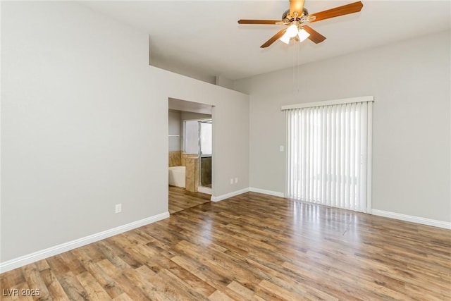 472 Tiger Lily Way, Henderson, NV 89015 - empty room featuring wood finished floors, a ceiling fan, and baseboards