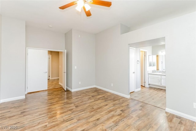 472 Tiger Lily Way, Henderson, NV 89015 - spare room featuring light wood-style flooring, ceiling fan, and baseboards