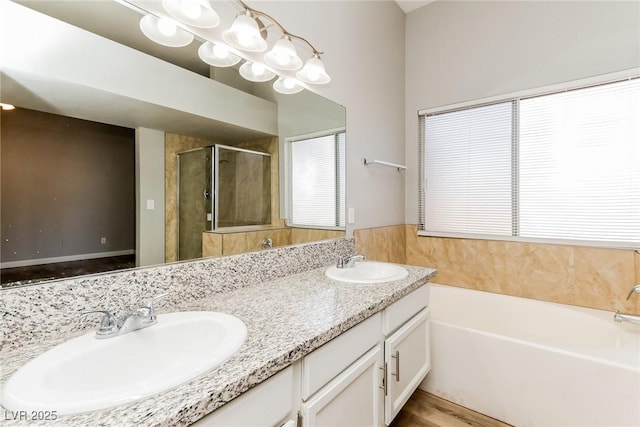472 Tiger Lily Way, Henderson, NV 89015 - full bathroom featuring a garden tub, a stall shower, and double vanity