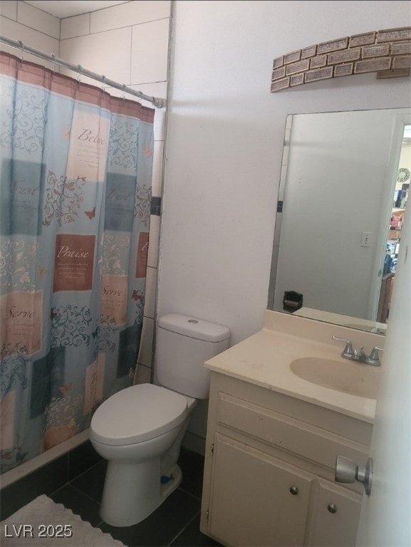 6231 Santa Maria Ave, Las Vegas, NV 89108 - full bath with vanity, toilet, tile patterned floors, and a shower with curtain