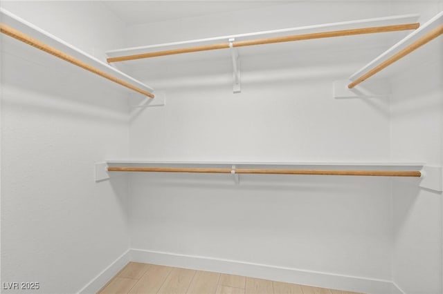 3111 Bel Air Dr Unit 24G, Las Vegas, NV 89109 - spacious closet with light wood-style floors