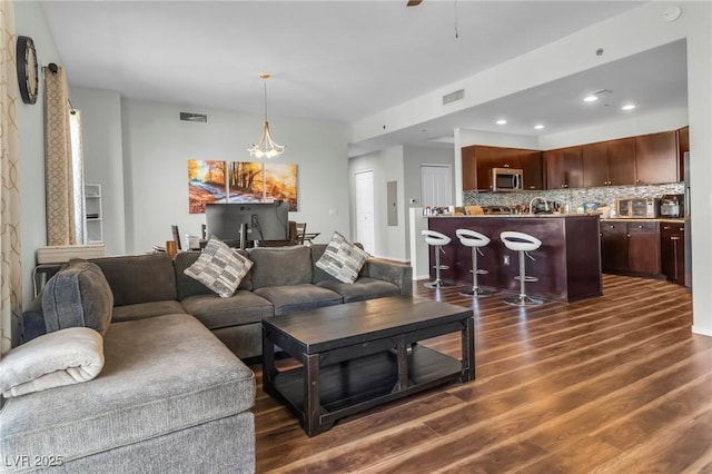 8255 Las Vegas Blvd Unit 719, Las Vegas, NV 89123 - living room with dark wood-style flooring, recessed lighting, and a ceiling fan