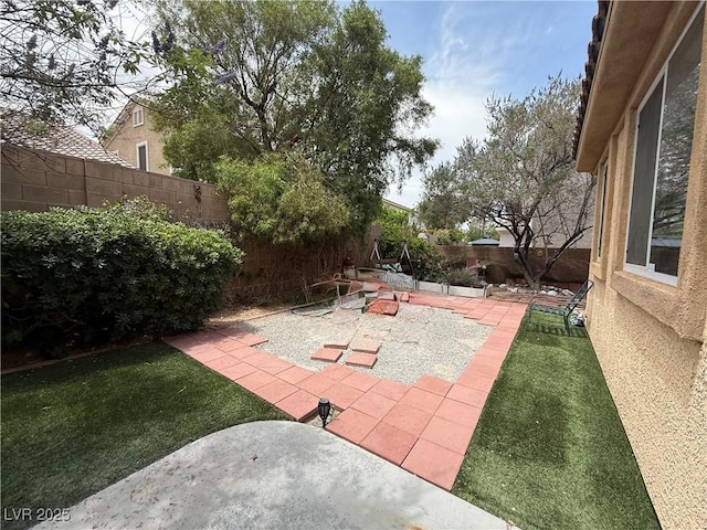 11457 Steponia Bay St, Las Vegas, NV 89141 - fenced backyard with a patio area