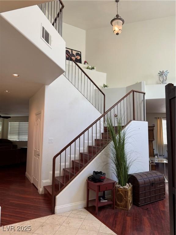 11457 Steponia Bay St, Las Vegas, NV 89141 - stairs featuring wood finished floors and recessed lighting
