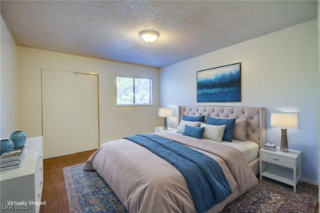 1316 Capri Drive A,B,C,&D, Boulder City, NV 89005 - bedroom with a closet, a textured ceiling, and wood finished floors