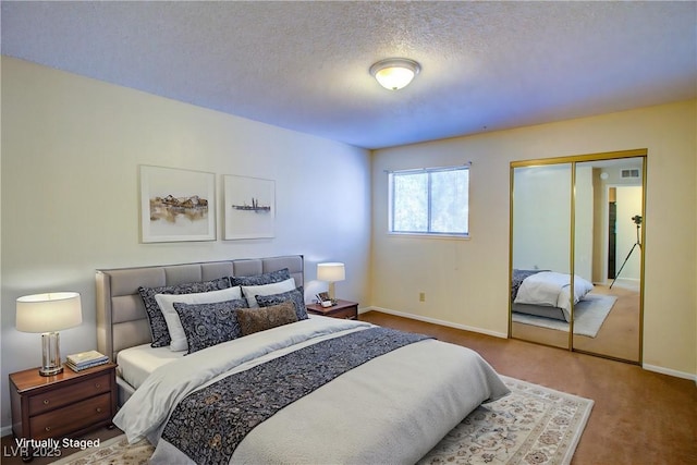 1316 Capri Drive A,B,C,&D, Boulder City, NV 89005 - bedroom featuring baseboards, a closet, carpet, and a textured ceiling