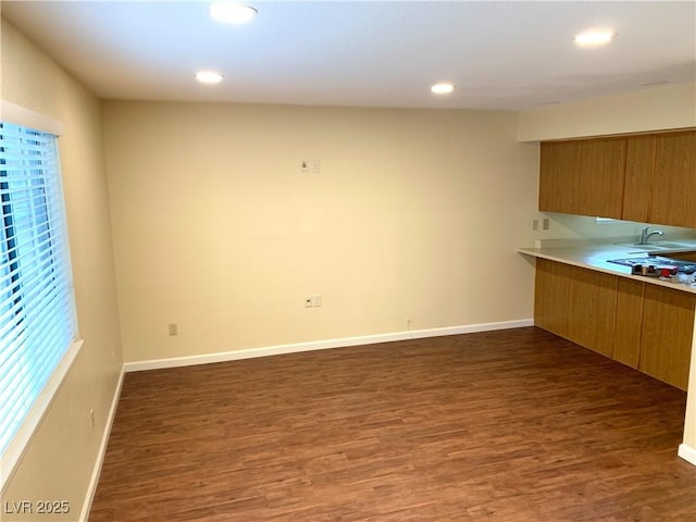 1316 Capri Drive A,B,C,&D, Boulder City, NV 89005 - kitchen with wood finished floors, a sink, baseboards, light countertops, and recessed lighting