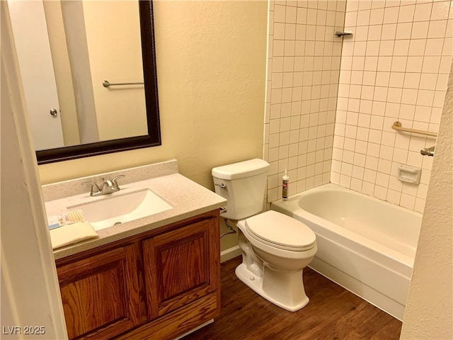 1316 Capri Drive A,B,C,&D, Boulder City, NV 89005 - bathroom with vanity, toilet, wood finished floors,  shower combination, and a textured wall