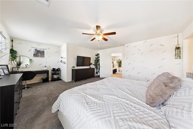 1885 Vass Springs Pl, North Las Vegas, NV 89084 - bedroom with carpet floors, a desk, and ceiling fan