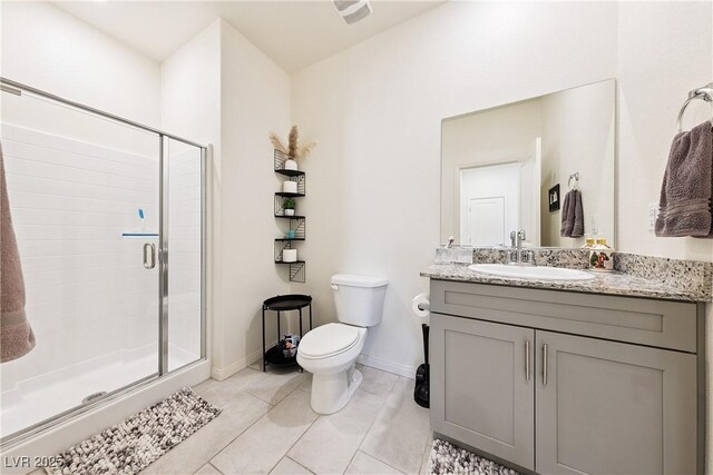 1885 Vass Springs Pl, North Las Vegas, NV 89084 - bathroom featuring a stall shower, vanity, and tile patterned floors