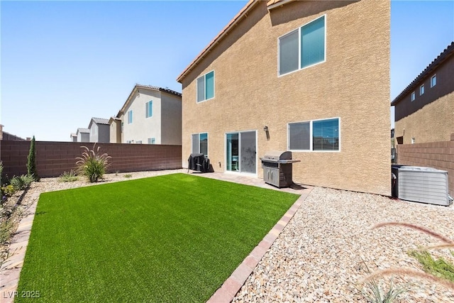 1885 Vass Springs Pl, North Las Vegas, NV 89084 - rear view of property featuring stucco siding, a fenced backyard, and a patio area