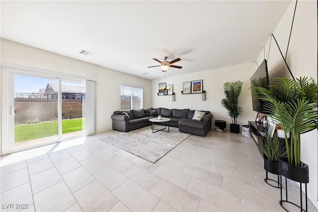 1885 Vass Springs Pl, North Las Vegas, NV 89084 - living room featuring a ceiling fan and light tile patterned floors