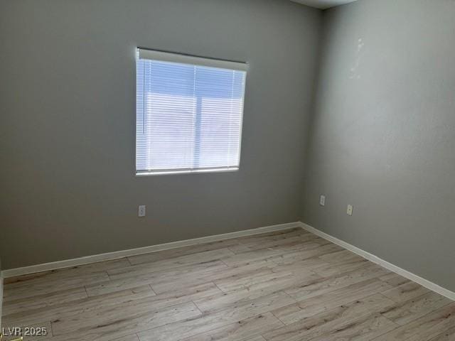 6170 E Sahara Ave Unit 1012, Las Vegas, NV 89142 - spare room featuring light wood-style flooring and baseboards