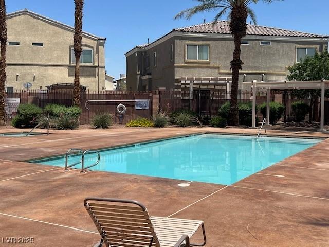 6170 E Sahara Ave Unit 1012, Las Vegas, NV 89142 - community pool with a patio