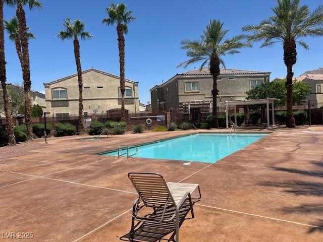 6170 E Sahara Ave Unit 1012, Las Vegas, NV 89142 - community pool with a patio area and a pergola