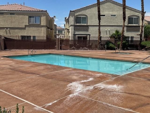 6170 E Sahara Ave Unit 1012, Las Vegas, NV 89142 - community pool featuring a patio