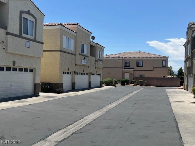6170 E Sahara Ave Unit 1012, Las Vegas, NV 89142 - view of asphalt road with a residential view