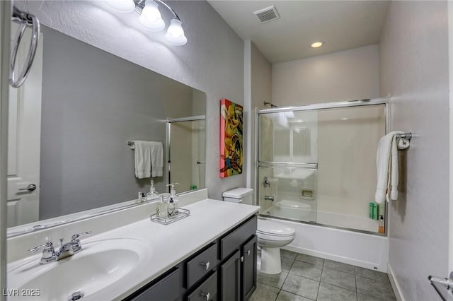 459 Astillero St, Las Vegas, NV 89138 - full bath featuring toilet, tile patterned flooring, vanity, and enclosed tub / shower combo