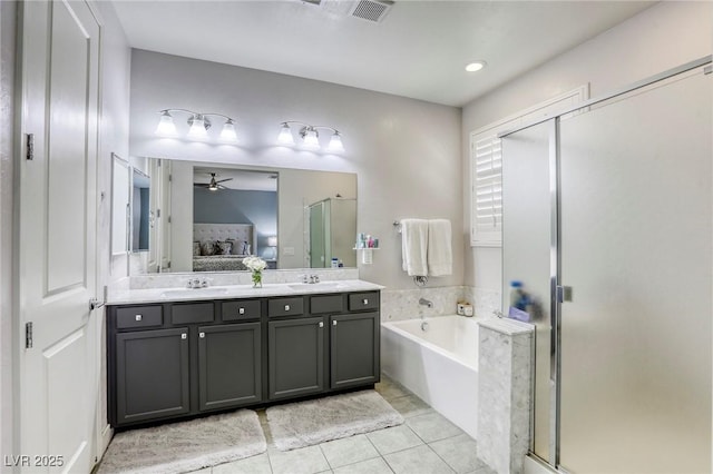 459 Astillero St, Las Vegas, NV 89138 - bathroom featuring a stall shower, a bath, double vanity, ceiling fan, and tile patterned floors