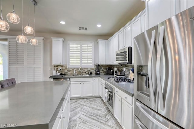 459 Astillero St, Las Vegas, NV 89138 - kitchen with appliances with stainless steel finishes, plenty of natural light, tasteful backsplash, and recessed lighting