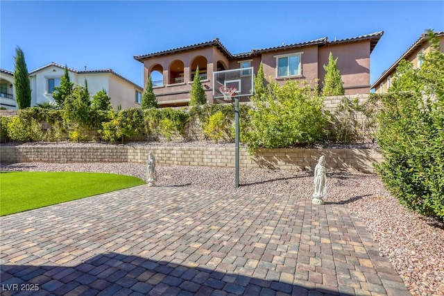 459 Astillero St, Las Vegas, NV 89138 - view of front of house featuring stucco siding and a tile roof