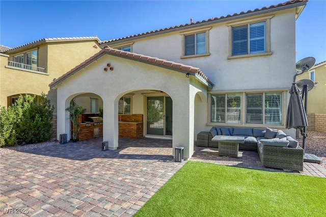 459 Astillero St, Las Vegas, NV 89138 - back of house featuring an outdoor living space, a patio area, area for grilling, and stucco siding