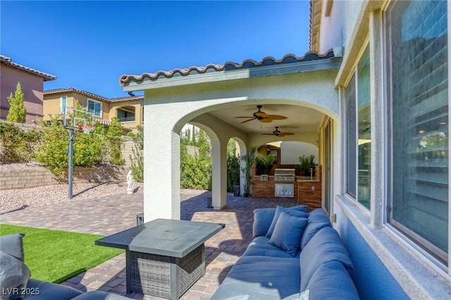 459 Astillero St, Las Vegas, NV 89138 - view of patio / terrace with an outdoor kitchen, ceiling fan, and an outdoor hangout area