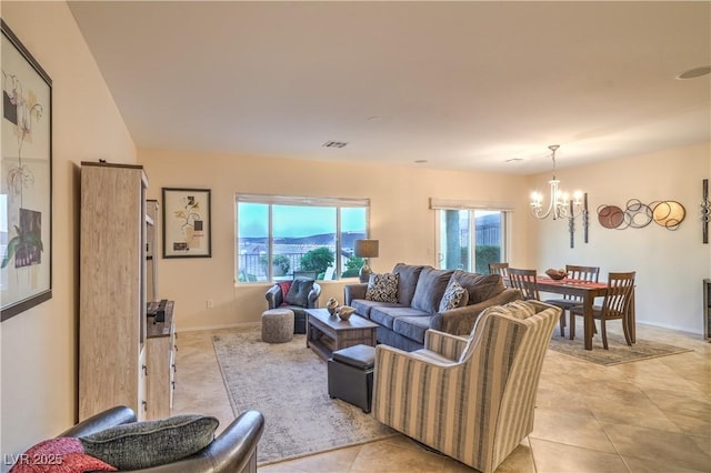 2144 Marywood Park Ct, Henderson, NV 89044 - living area with a chandelier, light tile patterned floors, and plenty of natural light