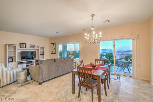 2144 Marywood Park Ct, Henderson, NV 89044 - dining space featuring a chandelier, baseboards, and light tile patterned flooring
