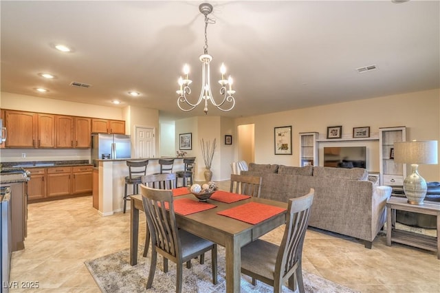 2144 Marywood Park Ct, Henderson, NV 89044 - dining space with a chandelier and recessed lighting