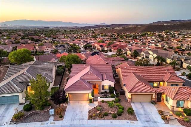 2144 Marywood Park Ct, Henderson, NV 89044 - aerial view at dusk of a residential view and a mountain view