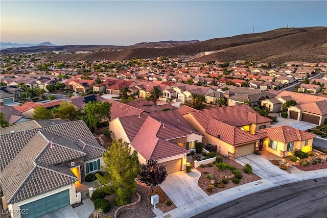 2144 Marywood Park Ct, Henderson, NV 89044 - aerial view at dusk of a residential view and a mountain view