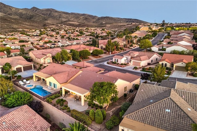 2144 Marywood Park Ct, Henderson, NV 89044 - aerial view of residential area featuring a mountainous background and a pool area