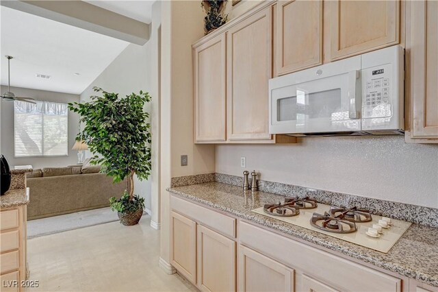 467 Beardsley Cir, Henderson, NV 89052 - kitchen featuring white appliances, light brown cabinetry, and open floor plan