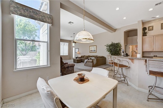 467 Beardsley Cir, Henderson, NV 89052 - dining room with baseboards, recessed lighting, beam ceiling, and arched walkways