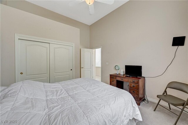 467 Beardsley Cir, Henderson, NV 89052 - carpeted bedroom featuring a closet, high vaulted ceiling, baseboards, and ceiling fan