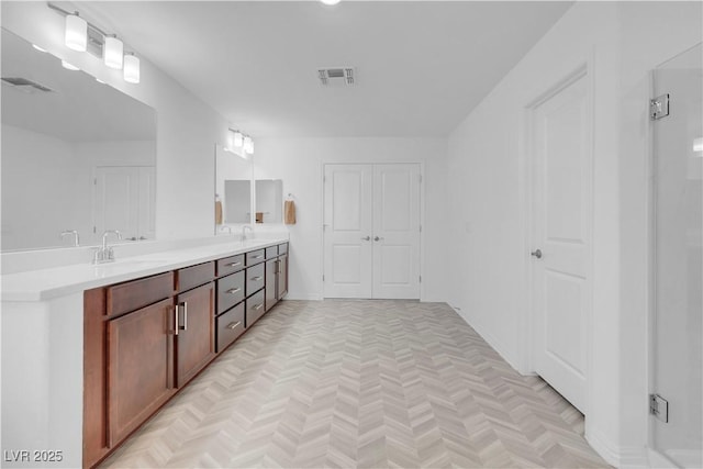 7260 Grace Estate Ave, Las Vegas, NV 89113 - full bathroom featuring double vanity and baseboards