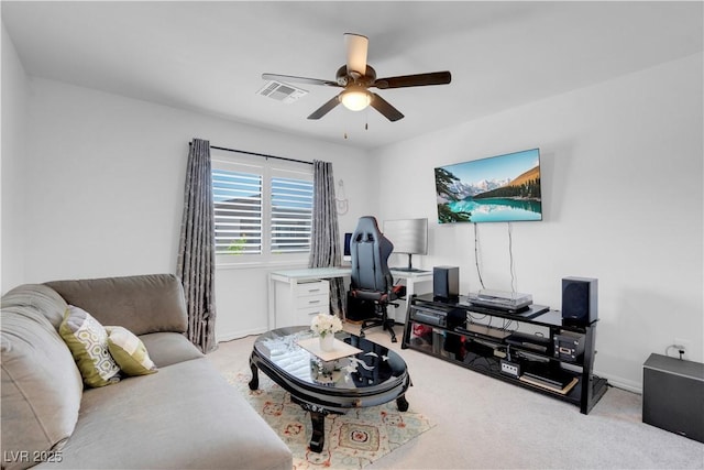 7260 Grace Estate Ave, Las Vegas, NV 89113 - living room with a ceiling fan, a desk, carpet floors, and baseboards