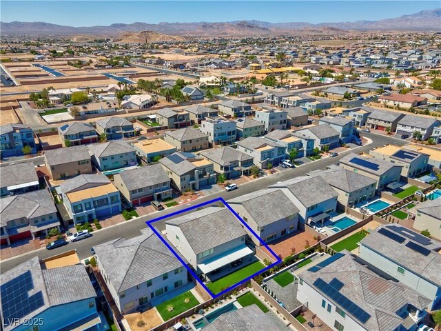 7260 Grace Estate Ave, Las Vegas, NV 89113 - aerial perspective of suburban area with a mountain backdrop and property boundaries highlighted