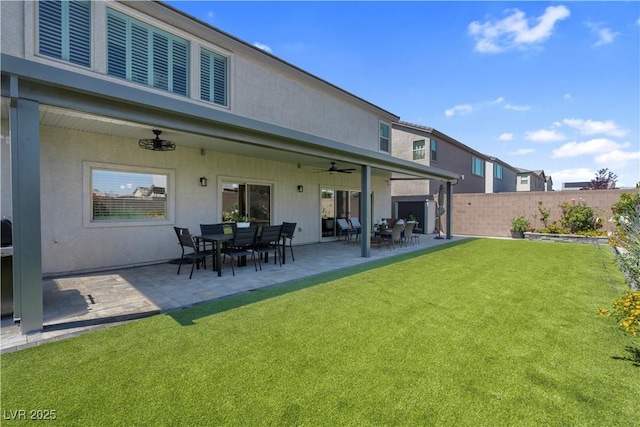 7260 Grace Estate Ave, Las Vegas, NV 89113 - back of house featuring a ceiling fan, stucco siding, and a patio